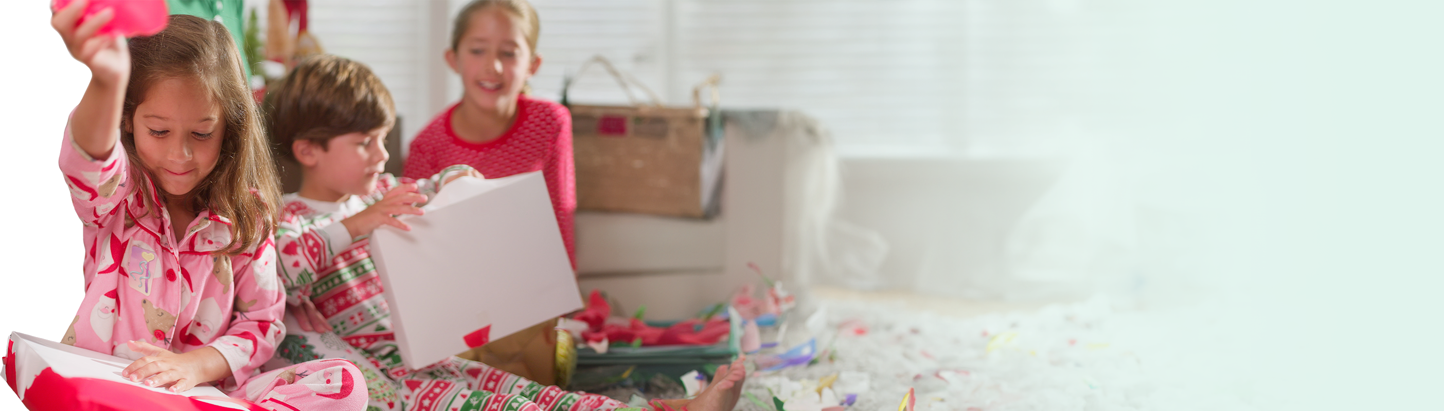 Girl opening gifts